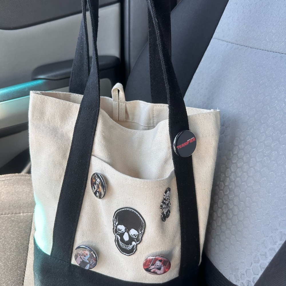 Spirit Halloween tote bag with terrifier pins